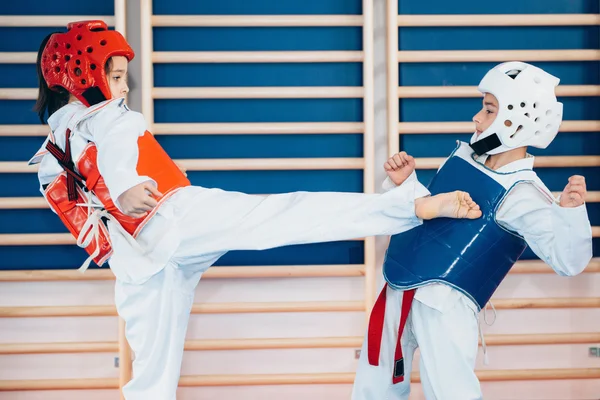 depositphotos 115179672 stock photo taekwondo children sparring